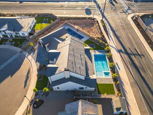 Aerial view of property and surrounding area with a pool
