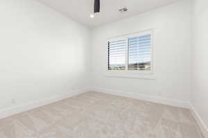 Unfurnished room featuring light colored carpet, recessed lighting, and ceiling fan