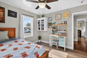 Bedroom with light wood-type flooring and ceiling fan