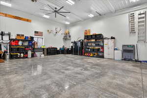 Garage featuring ceiling fan