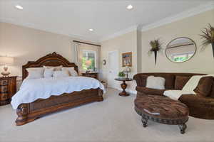 Bedroom with carpet, ornamental molding, and recessed lighting