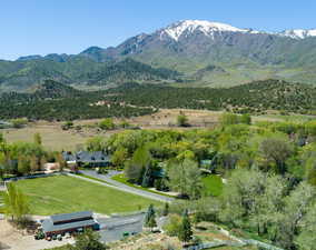 View of mountain backdrop featuring rural landscape