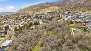 Aerial view of residential area featuring mountains
