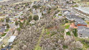 Aerial view of property's location featuring nearby suburban area