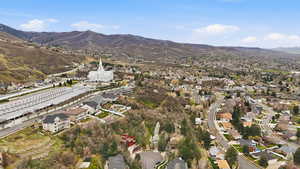 Aerial perspective of suburban area featuring mountains