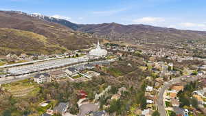 Aerial view of residential area with a mountainous background