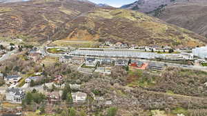 Aerial view of residential area with a mountainous background