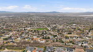 Aerial view of residential area with mountains