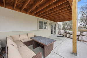 View of patio with outdoor seating and french doors