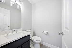 Bathroom featuring vanity and light wood-type flooring