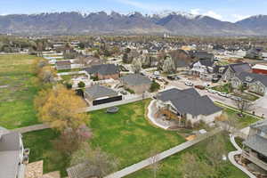 View of property location featuring a mountainous background and nearby suburban area