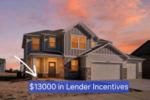 Craftsman-style home featuring stone siding, board and batten siding, a garage, and driveway
