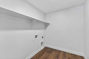 Laundry room featuring dark wood-style flooring, electric dryer hookup, and hookup for a washing machine