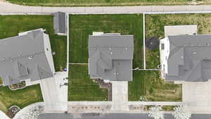 Aerial perspective of suburban area with property parcel outlined
