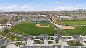 Aerial perspective of suburban area with a mountain backdrop
