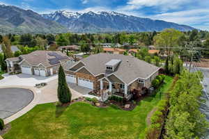 Aerial view of residential area featuring mountains