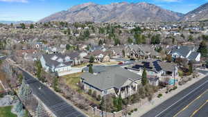 Aerial view of residential area featuring a mountain backdrop