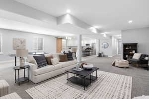 Family room with carpet, and recessed lighting