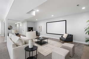 Family room featuring light colored carpet and recessed lighting