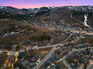 Aerial view at dusk of a mountain view and a residential view