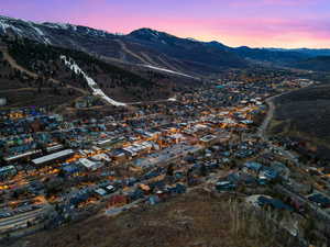 View of mountain backdrop with nearby suburban area