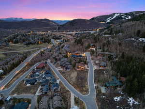 Aerial view at dusk of a mountain view and a residential view