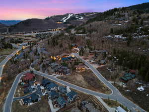 Aerial view at dusk of a mountain view and a residential view