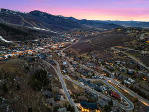 Aerial view at dusk of a mountain view and a residential view
