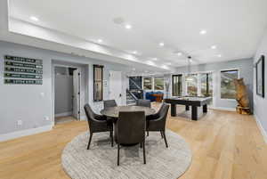 Dining area featuring billiards table, recessed lighting, and light wood-style floors