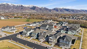 Aerial perspective of suburban area featuring mountains