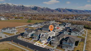 Aerial view of residential area with a mountain backdrop