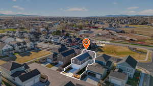 Aerial perspective of suburban area with mountains