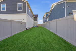 View of fenced backyard