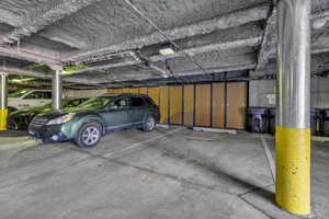 Garage featuring a parking garage