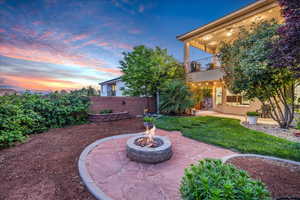 Patio / terrace with a patio and a fire pit
