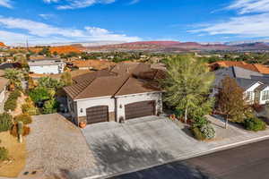 Aerial view of residential area with a mountainous background