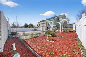 View of fenced backyard