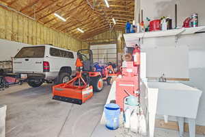 Garage featuring a sink