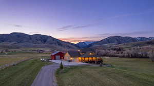 View of mountain backdrop featuring rural landscape