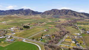 Overview of rural landscape with a mountain backdrop