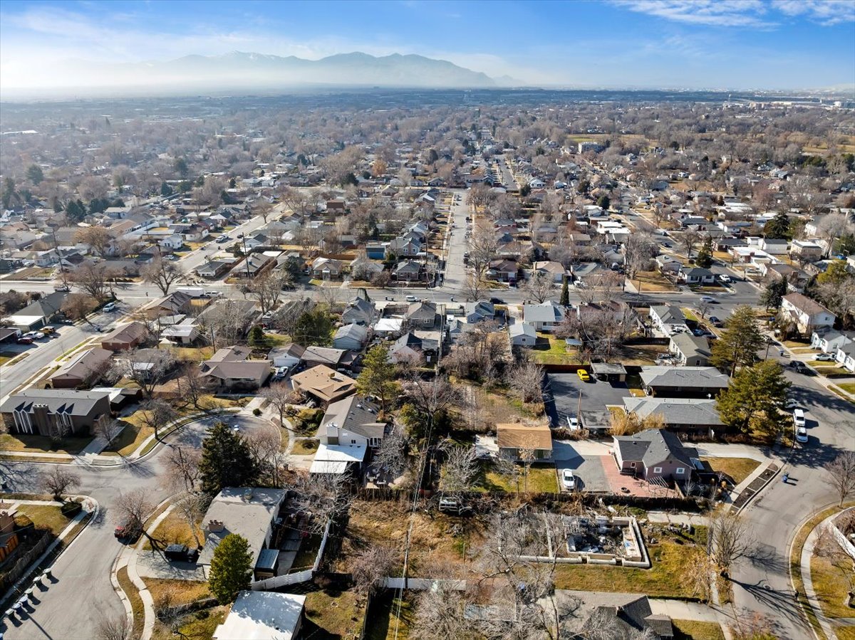 Aerial view of residential area with a mountain backdrop