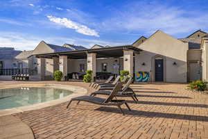 Community pool with a patio area