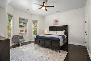 Bedroom featuring baseboards and a ceiling fan