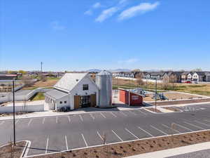 Nearby community barn adds to the neighborhood amenities along with surrounding parks and walking trails.