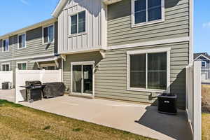 Large patio and backyard space offering potential for fencing and outdoor enjoyment.