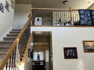 Stairs featuring hanging lights