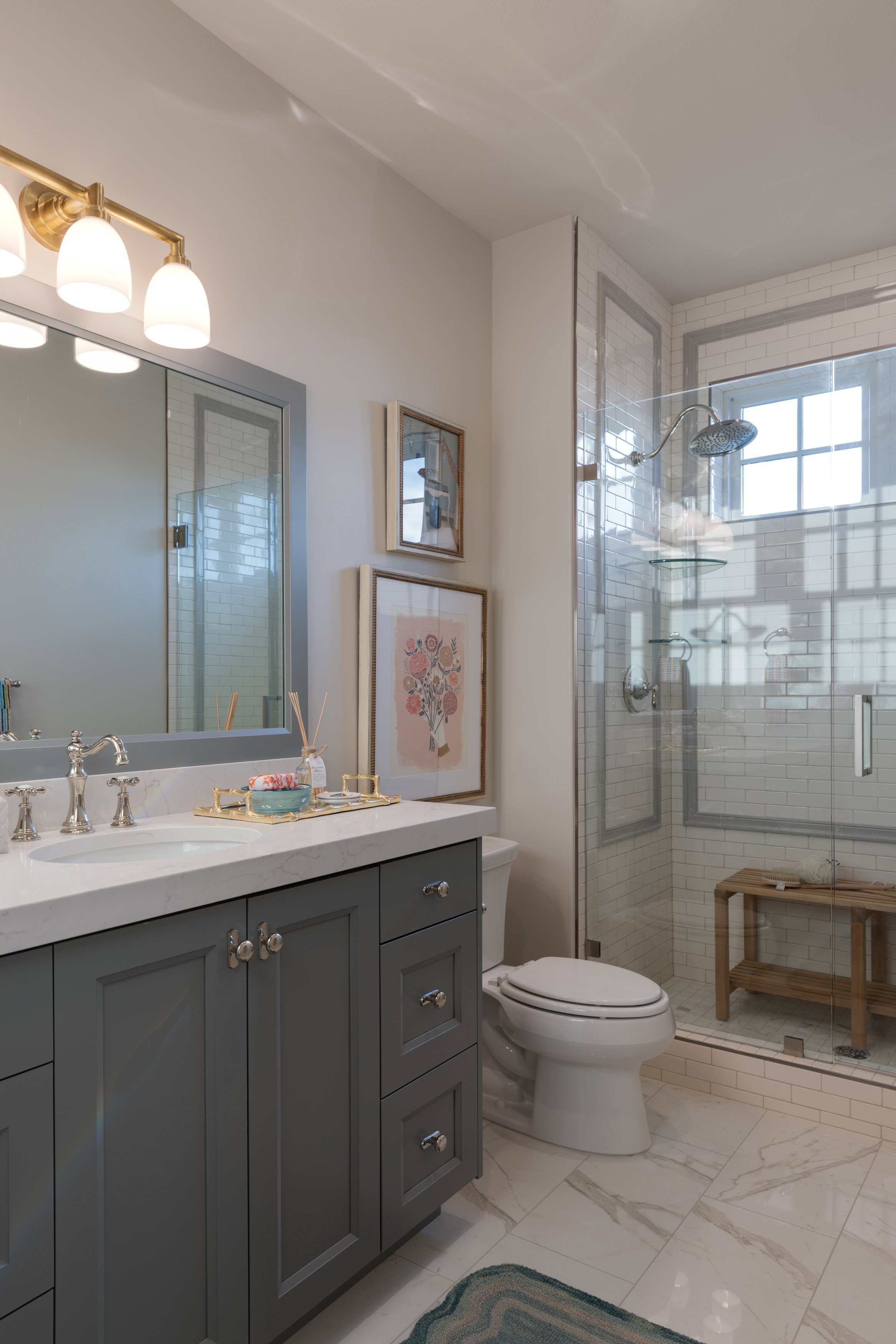 Bathroom featuring vanity and a stall shower