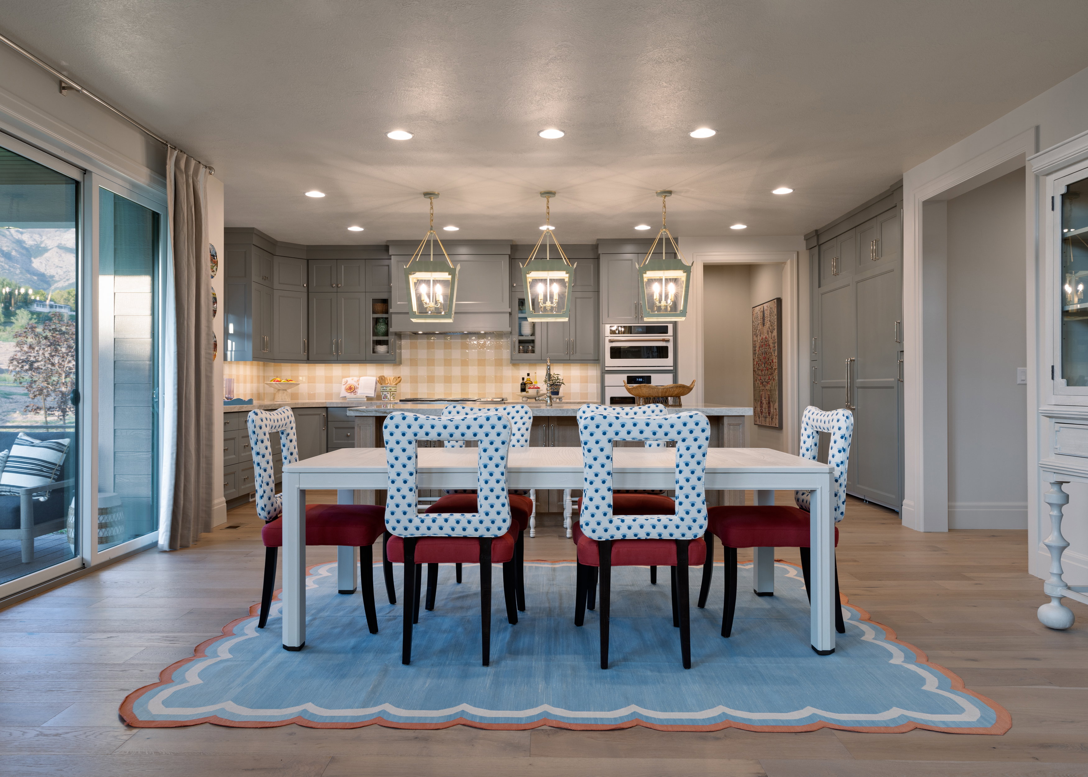 Dining space with light wood-type flooring and recessed lighting