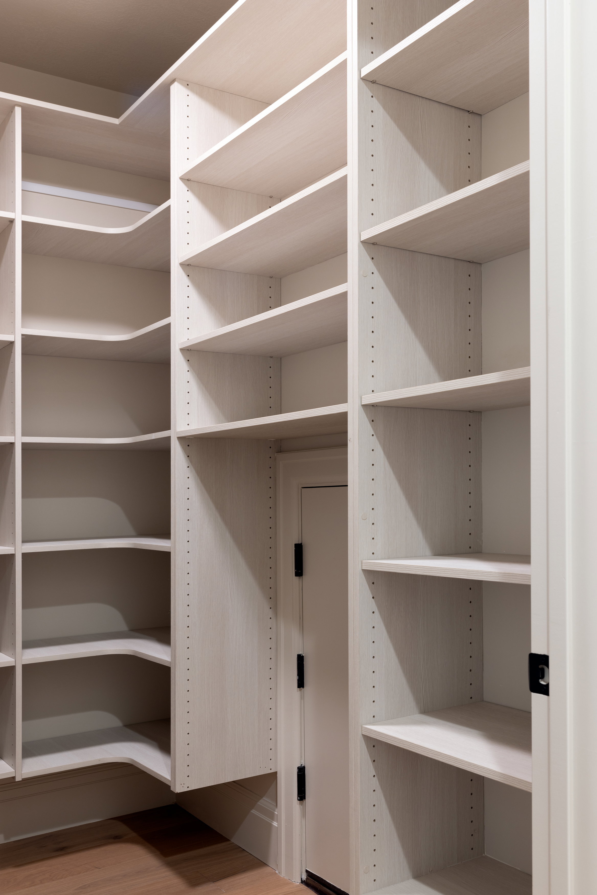 Walk in closet featuring light wood finished floors