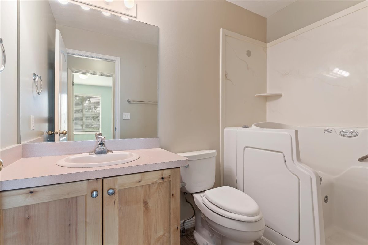 Bathroom with vanity and toilet